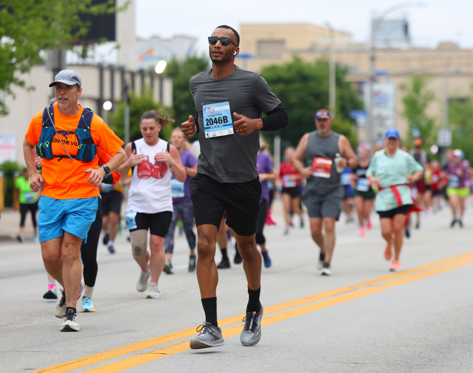 Broadway filled with runners.JPG